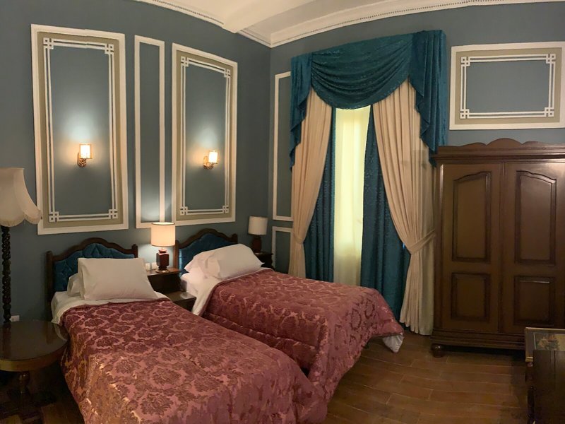 Cosmopolitan Plaza INN Hotel 21 - Room Example