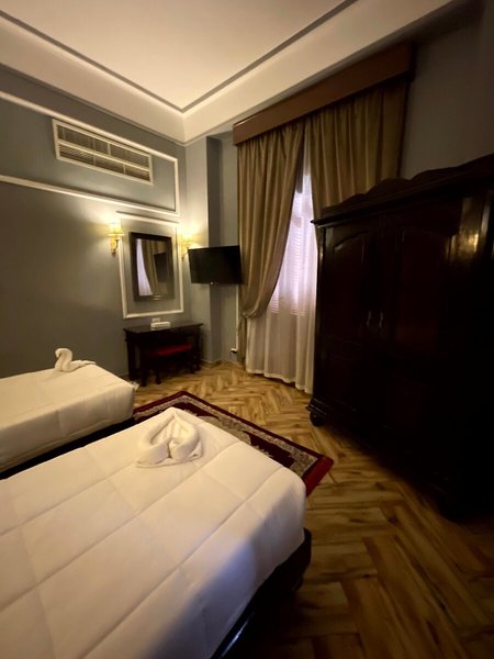 Cosmopolitan Plaza INN Hotel 24 - Room Example
