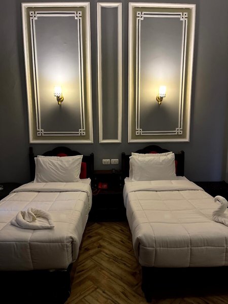 Cosmopolitan Plaza INN Hotel 25 - Room Example