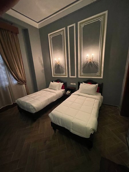 Cosmopolitan Plaza INN Hotel 26 - Room Example