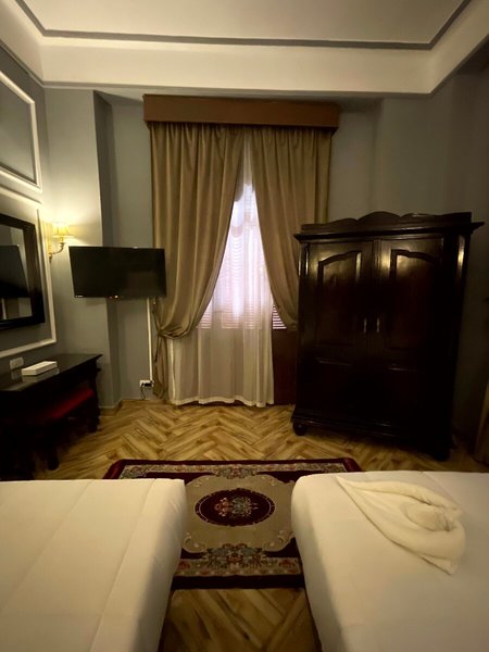 Cosmopolitan Plaza INN Hotel 27 - Room Example