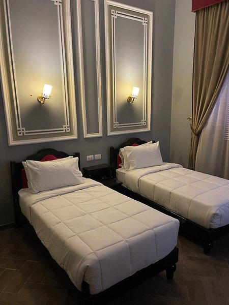 Cosmopolitan Plaza INN Hotel 29 - Room Example