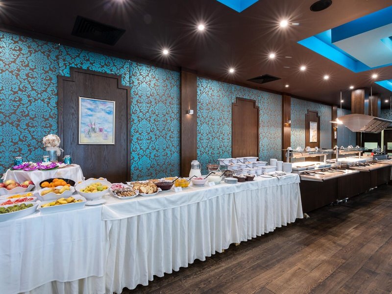Garden of Eden Hotel & Apartments 32 - Restaurant