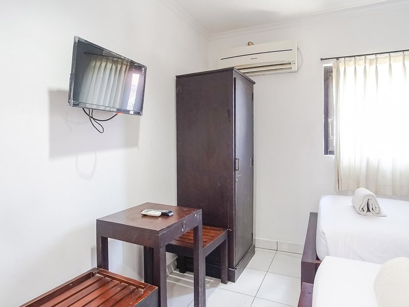 OYO 90082 Gana Inn Legian 9