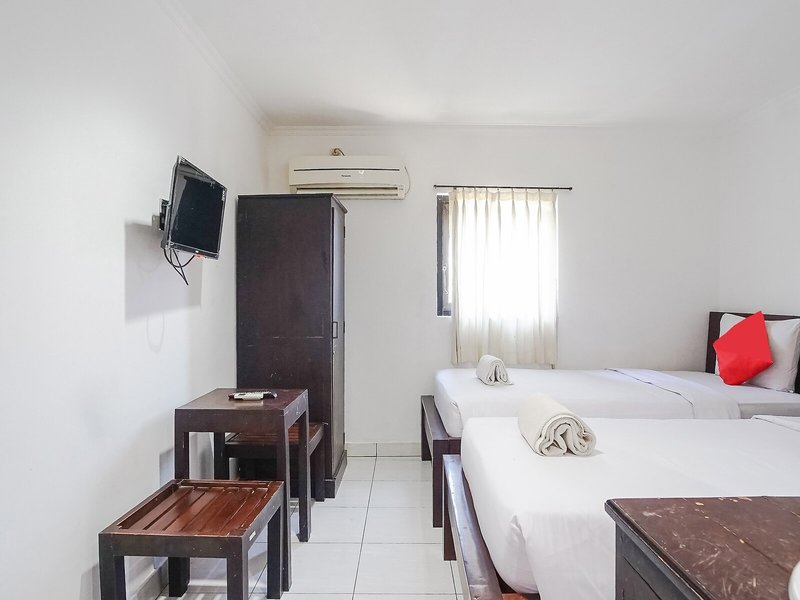 OYO 90082 Gana Inn Legian 11