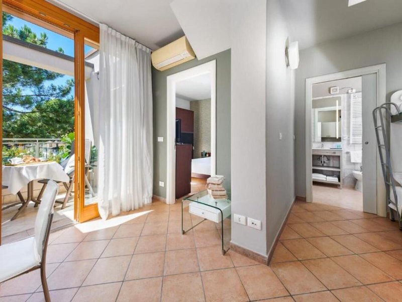 Hotel & Residence Poggio dei Pini 12 - Room Example