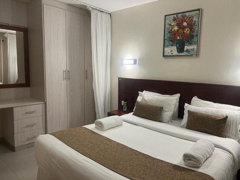 PrideInn Lantana Suites Hotel & Conferencing 10 - Room Example