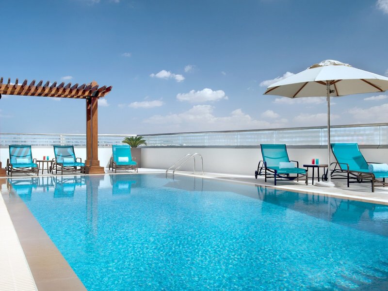 Hilton Garden Inn Dubai Al Muraqabat 5 - Outdoor Pool