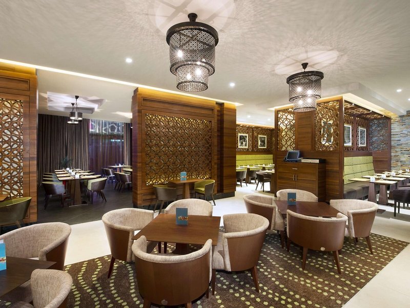 Hilton Garden Inn Dubai Al Muraqabat 13 - Restaurant